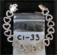 C1-33 sterling hearts bracelet w/clear stones