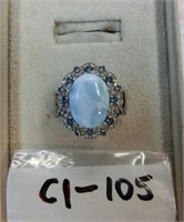 C1-105 sterling ring w/milky blue center stone