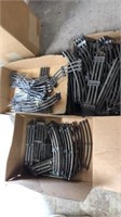 Pile of assorted Lionel model train tracks