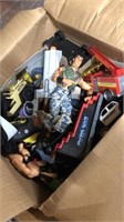 Box of action figures and vehicles plus more