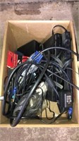 Box of assorted electronics. DVD players, cords,