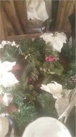 Holiday Greenery with white poinsettias and pine