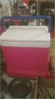 Red and white Igloo cooler
