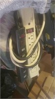 Group of two power strips a white and a black