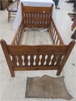 ANTIQUE CARVED YOUTH BED