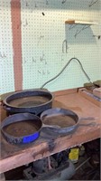 2 deep cast iron pans and a roaster