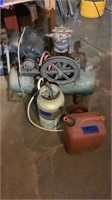 Gas can, Deico air compressor on wheels and a