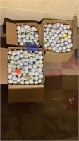 3 boxes of golf balls