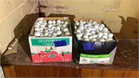 2 boxes of golf balls