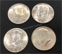 Four Kennedy Half Dollars (includes silver)