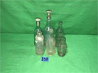 6 Assorted Clear Glass Bottles