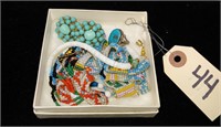 Box of Native American-style jewelry