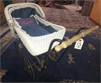 Old wicker baby stroller