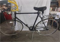 Black 10-speed bicycle with light & rack