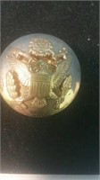 Larger brass military button maybe for a hat