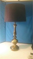 Satin finish brass table lamp with navy blue shade