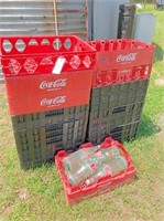 26 Coke crates & 4 qt bottles