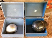 2-crash helmets in wooden boxes