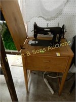 ANTIQUE DOMESTIC SEWING MACHINE ON STAND.