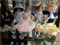 GROUP OF ASSORTED COLLECTIBLE DOLLS.