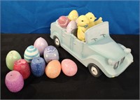 Easter decor chicks in car with decorated eggs