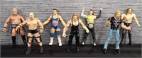 Lot of 7 Attitude Era WWE Action Figures