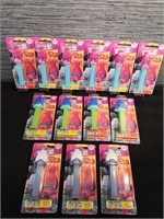 New - Lot of 13 PEZ Dispensers w/ Display Case