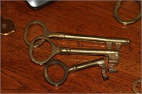 Lot of three brass skeleton keys
