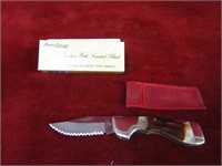 NIB Frost cutlery pocket knife. Serrated.