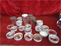 Box of glass fruit canning jar lids.