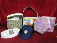 Hat boxes, hat, purse.