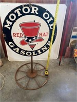 Red Hat Motor Oil & Gasoline sign on stand