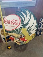 Coca-Cola boy sign
