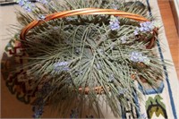 Silk flower arrangement in Wicker Basket
