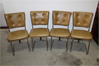 Four Mid Century Chairs one has tear on top pad