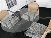 42 Inch Glass table and 3 chairs New Cushions