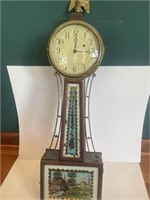 EARLY REVERSE PAINTED WALL CLOCK