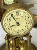 J L HUDSON CO METAL AND GLASS DOMED CLOCK