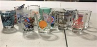 13 collectible shot glasses