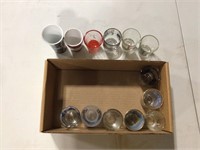 13 collectible shot glasses