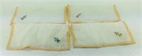 Four embroidered napkins floral