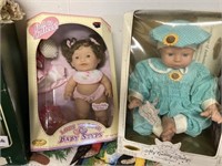 group of 4 dolls