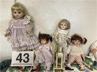 group of 4 porcelain dolls