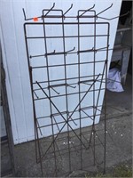 52.5” tall x 23” wide antique metal display rack