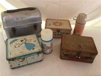 Four vintage lunch boxes