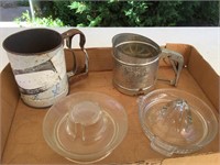 Two vintage sifters and juicers