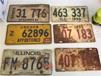 Six vintage license plates