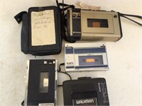 Vintage dictaphones and Walkman .  Unsure if