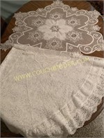 Lace tablecloth and large snowflake topper