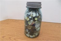 Ball quart jar full of buttons